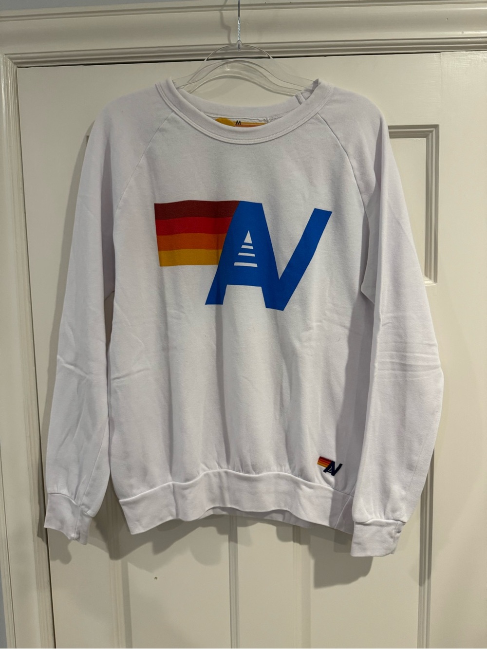 Aviator Nation White Sweatshirt with Blue AV Logo and Rainbow Stripe